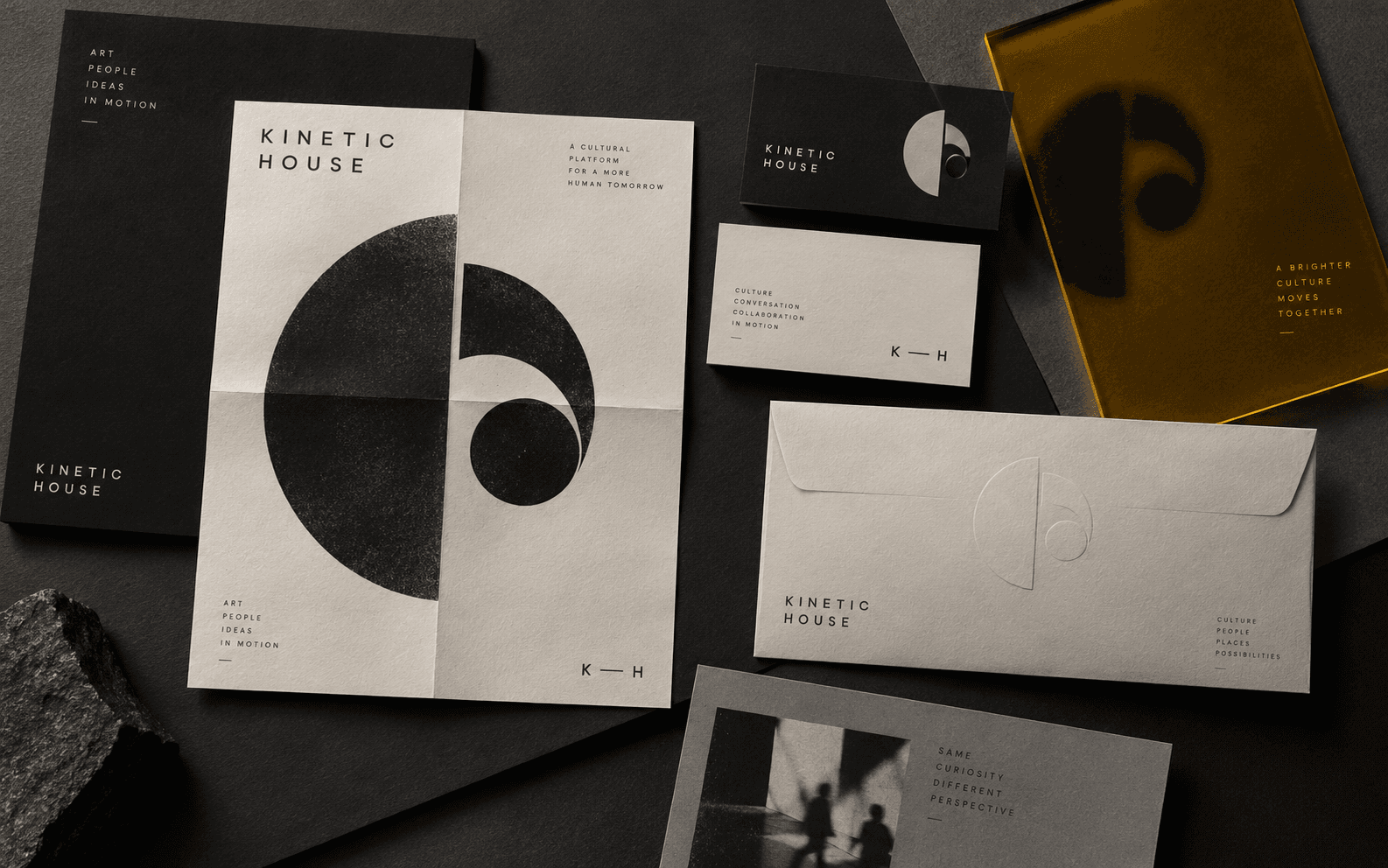 Kinetic House identity system across art-directed stationery and print pieces